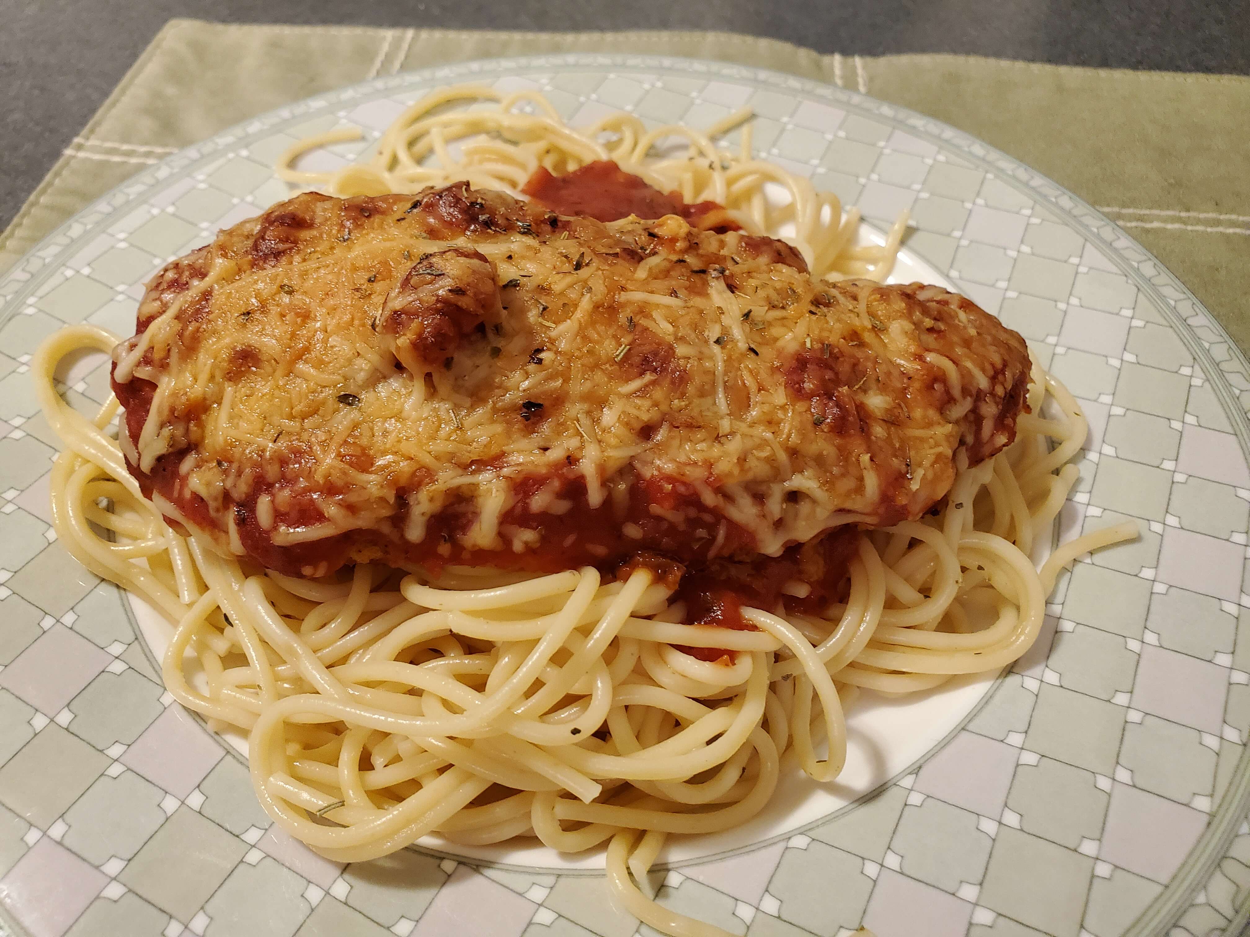 Chicken Parmesan over Pasta