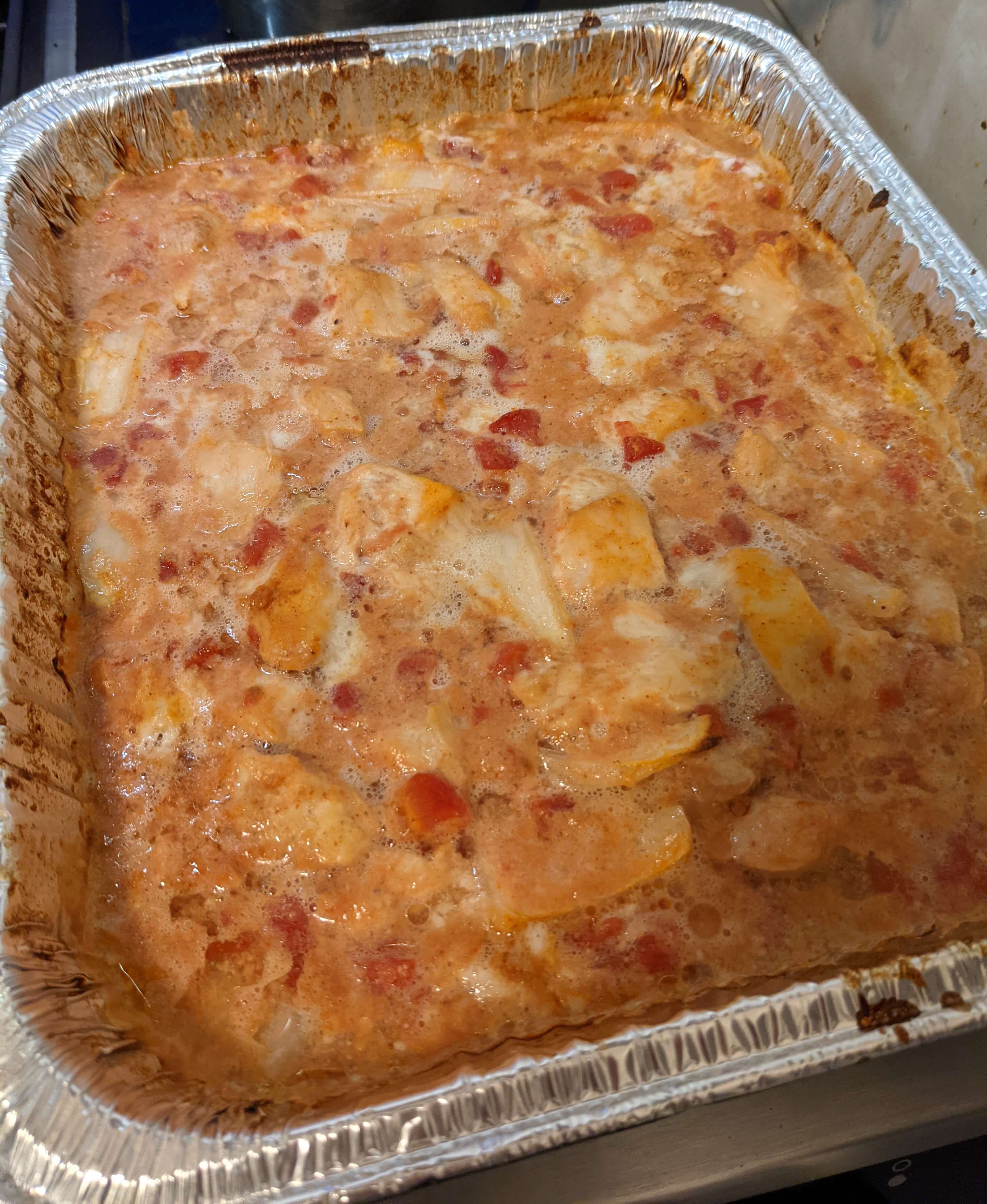 Chicken curry in an aluminum pan